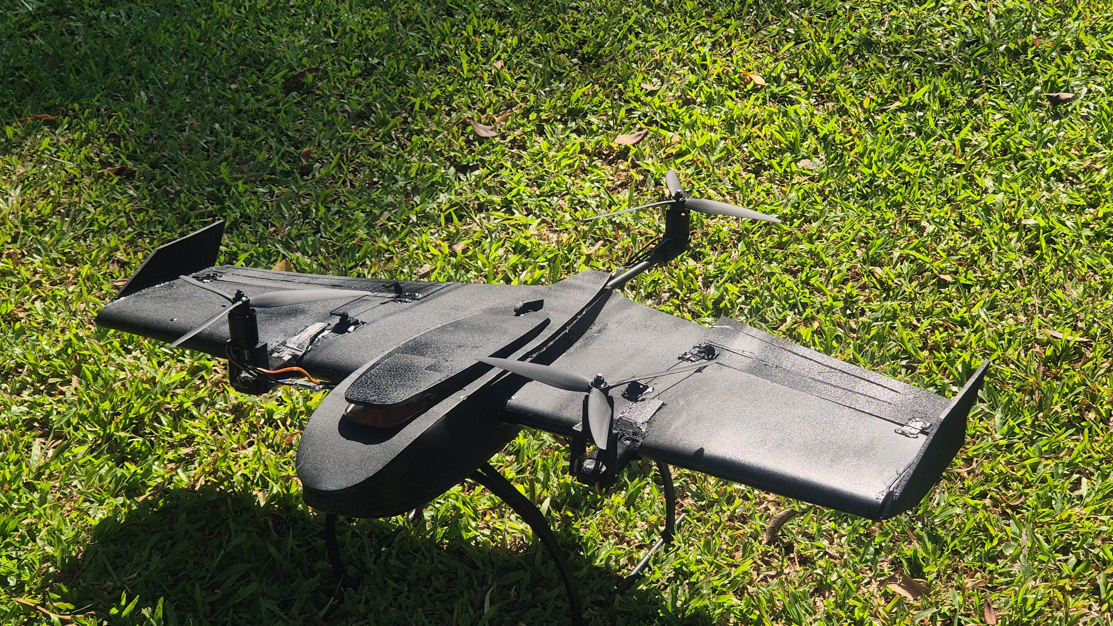 Design and Development of a Fixed-Wing Tricopter Drone System for Agile Navigation and High Flight Efficiency